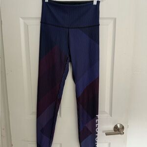 Peloton x WITH | Striped Purple and Black Leggings